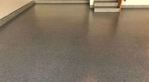 Completed garage with pristine epoxy floor