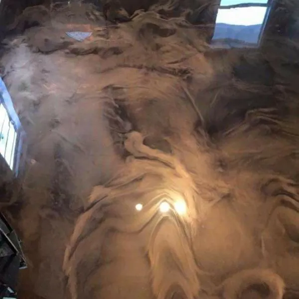 Metallic epoxy floor with swirled finish